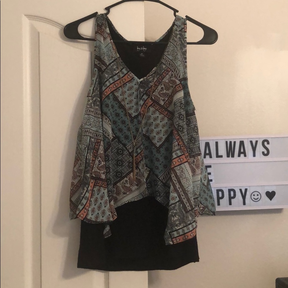 By & by juniors/woman’s top from Macy’s.